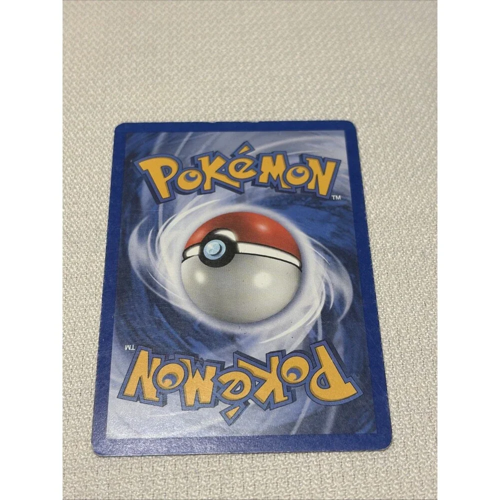 Kabuto 56/75 Neo Discovery Pokémon Card 2001 with Protective Sleeve NM